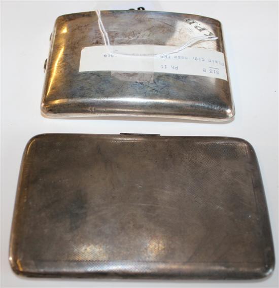 Two silver cigarette cases